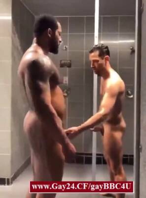 Black gay guy jerking off in the gym shower with a stranger - boyfriendtv.com